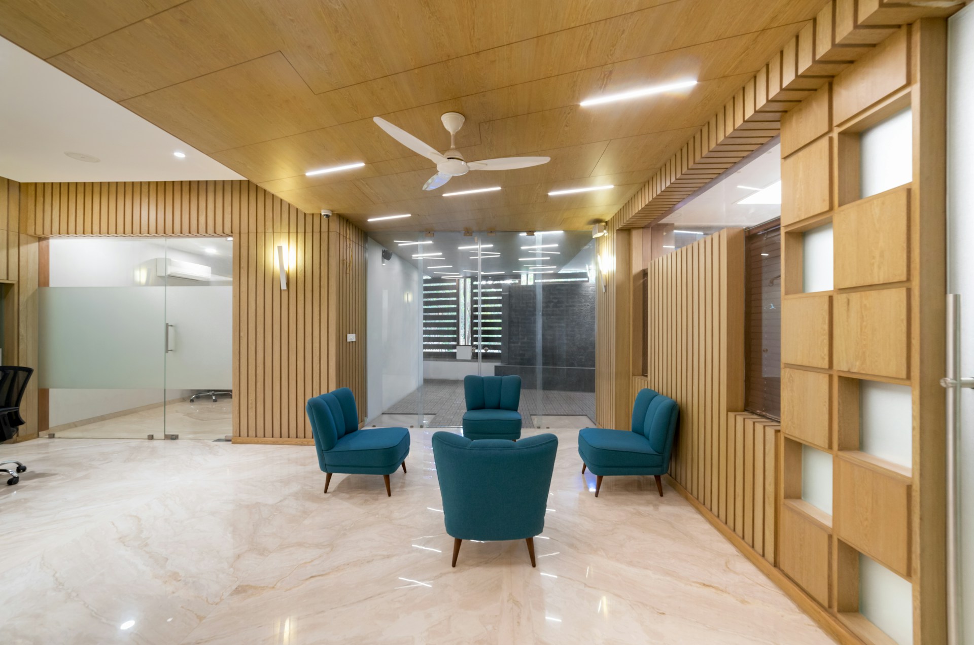 Modern business reception area with comfortable seating and professional interior