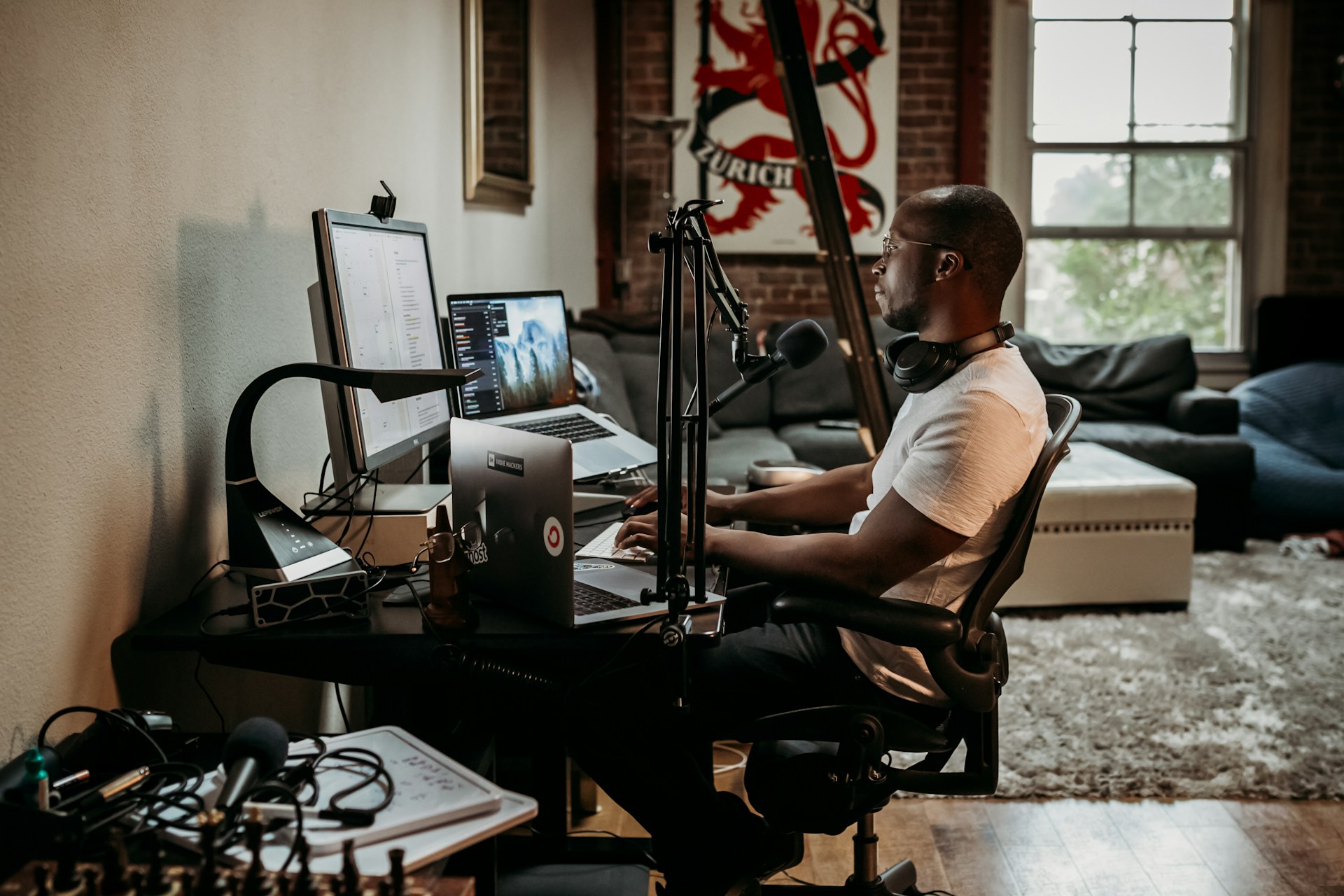 Professional podcast recording microphone with studio lighting
