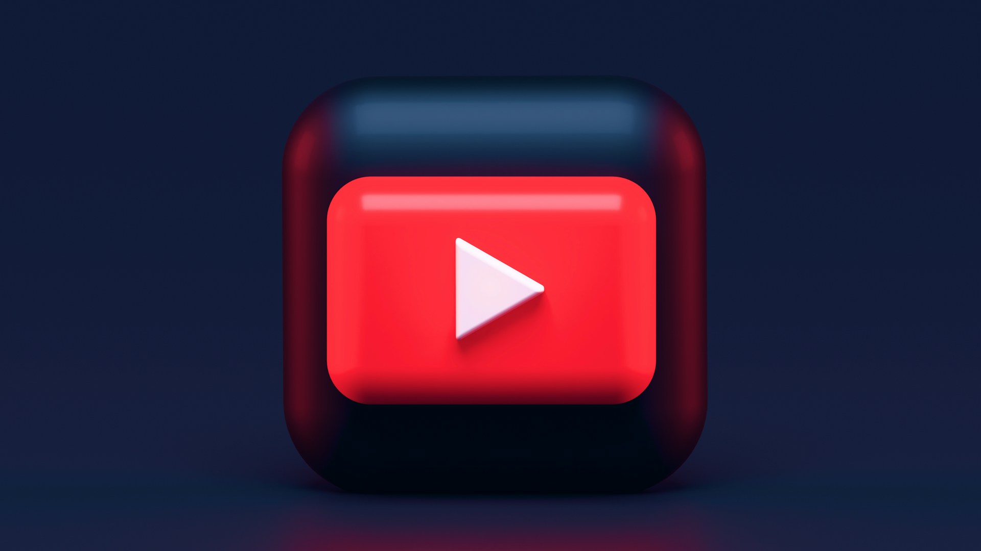 YouTube video player on a laptop screen in a modern living room setting