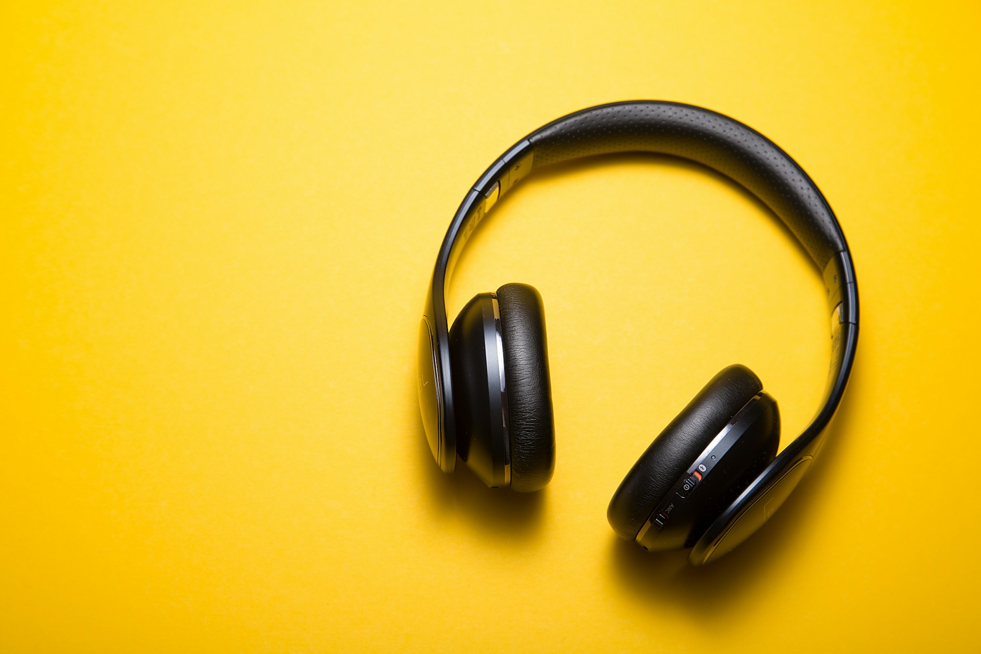 Person recording audio with professional microphone setup