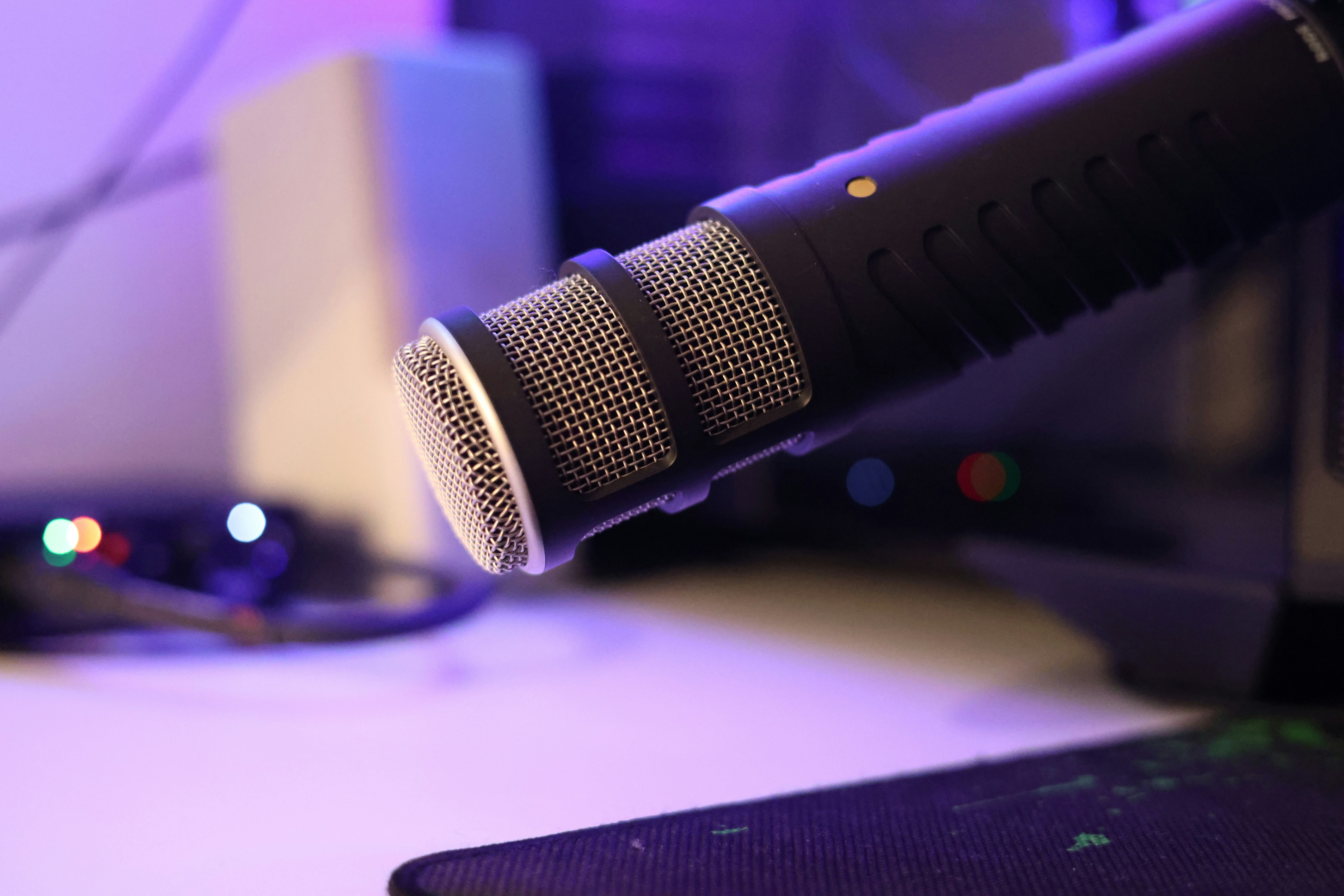 Close-up of a microphone on a recording desk